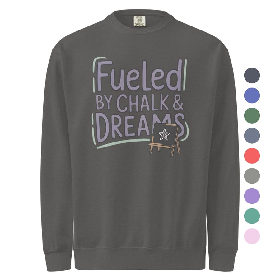 Fueled by Chalk & Dreams printed design on a vintage-style garment-dyed sweatshirt with chalkboard illustration – soft fleece ideal for teachers