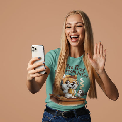 Woman wearing a t-shirt with a cartoon dog design and text, taking a selfie on a beige background