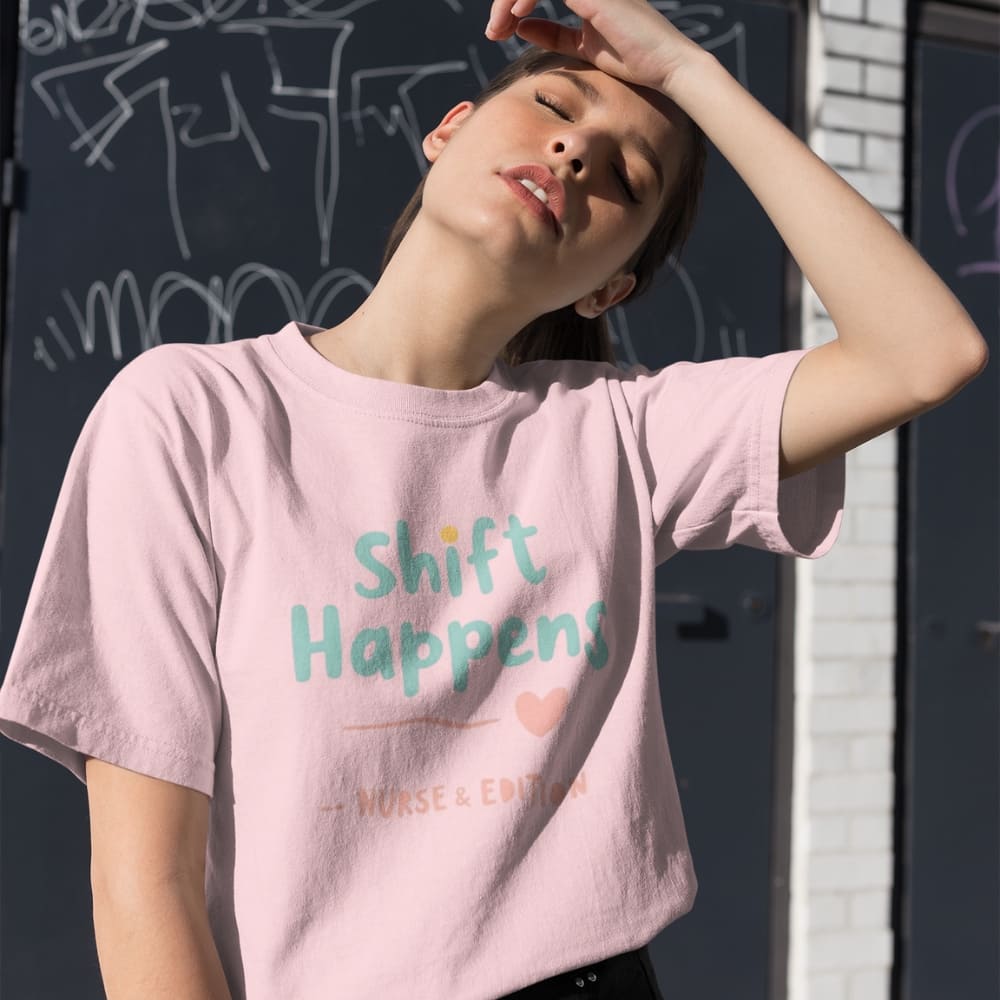“Shift Happens – Nurse Edition” pastel text design printed on a thick garment-dyed cotton t-shirt, perfect for nurses and healthcare professionals with a sense of humor.