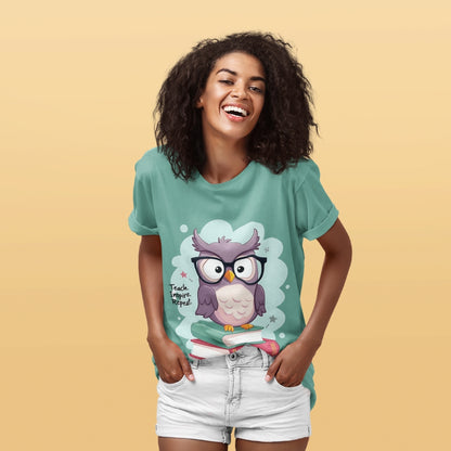 Cute purple owl with glasses sitting on stacked books, with quote "Teach. Inspire. Repeat." – printed on a teacher t-shirt