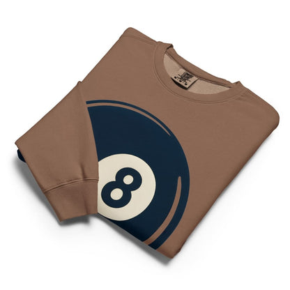 Folded brown sweatshirt with a blue and white eight-ball design on a white background