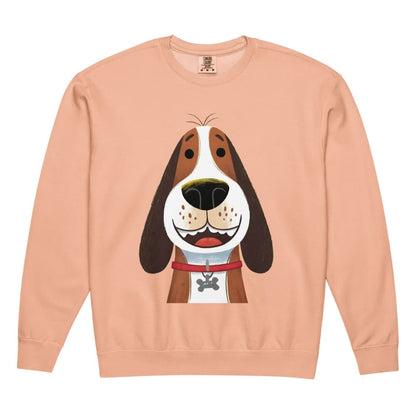 Peach-colored sweatshirt with a cartoon dog design on a white background