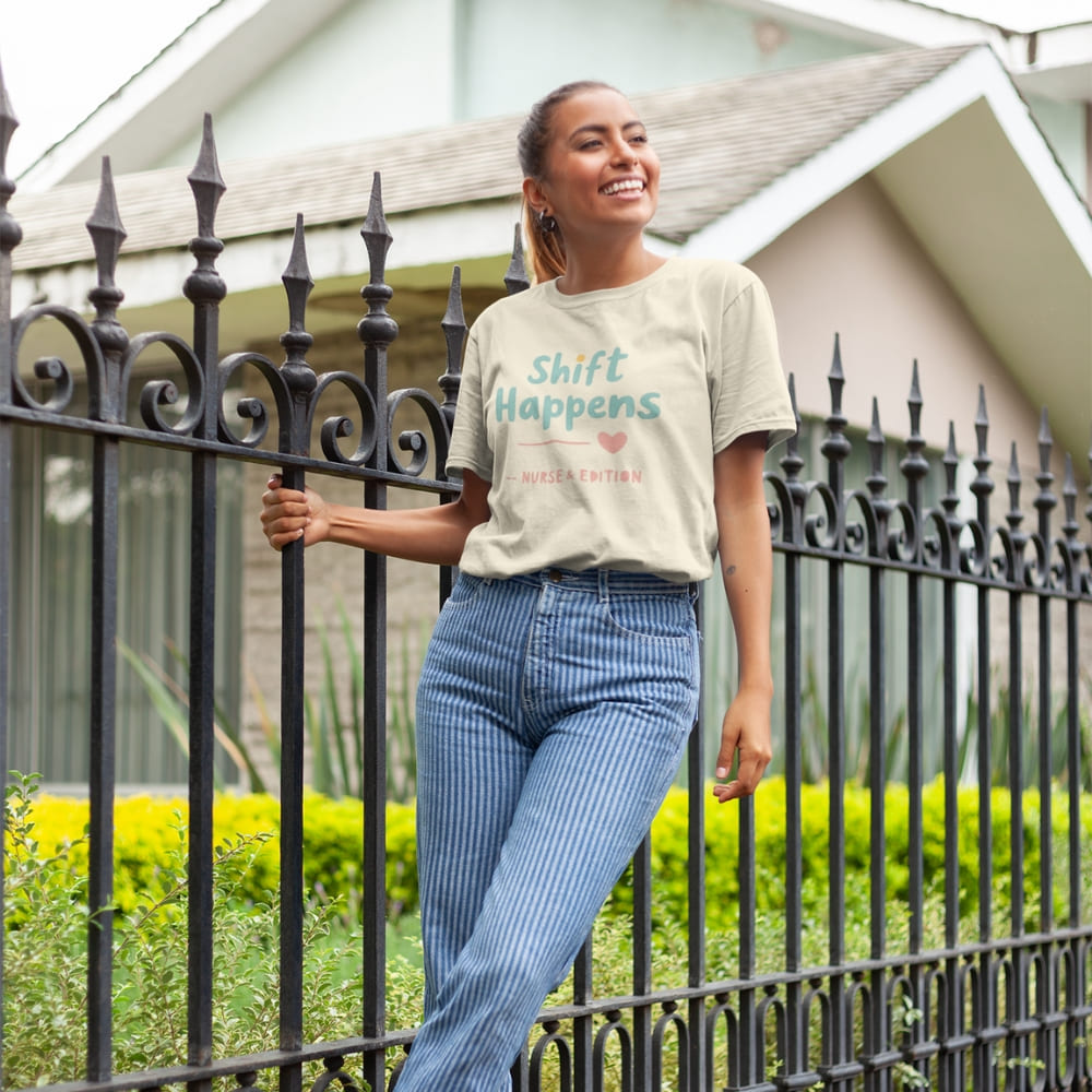 “Shift Happens – Nurse Edition” pastel text design printed on a thick garment-dyed cotton t-shirt, perfect for nurses and healthcare professionals with a sense of humor.