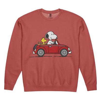 Red sweatshirt with cartoon characters driving a car on a white background