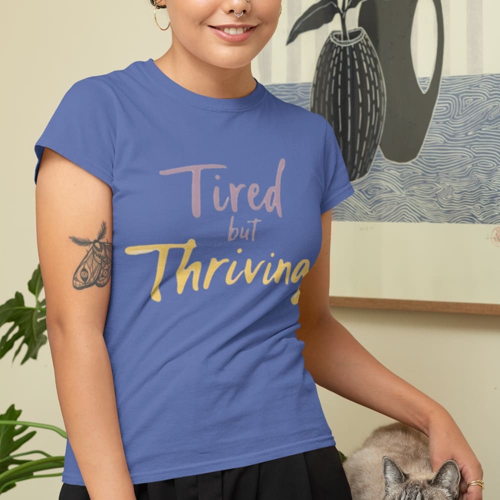 Garment-dyed relaxed fit t-shirt with motivational quote “Tired But Thriving” in modern handwritten script