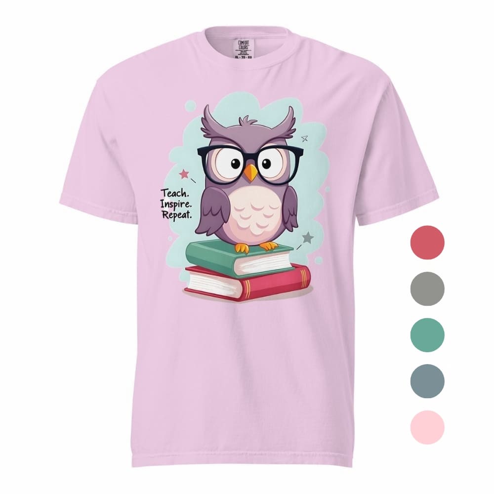 Cute purple owl with glasses sitting on stacked books, with quote "Teach. Inspire. Repeat." – printed on a teacher t-shirt