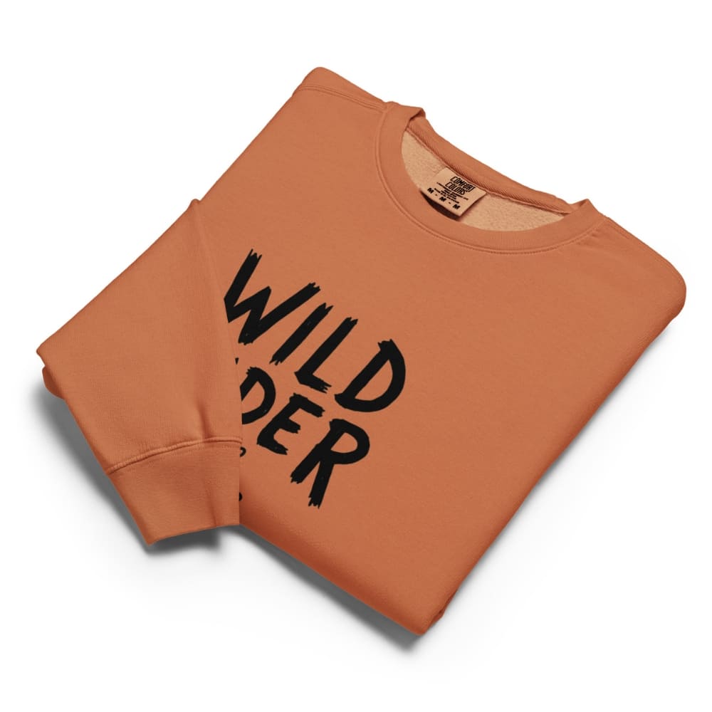 Orange sweatshirt with 'Wild Rider' text on a white background