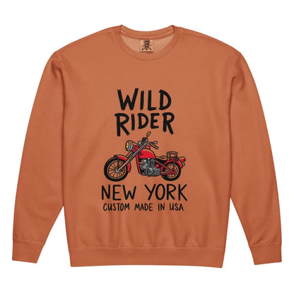 Orange sweatshirt with 'Wild Rider New York Custom Made in USA' text and motorcycle graphic on a white background