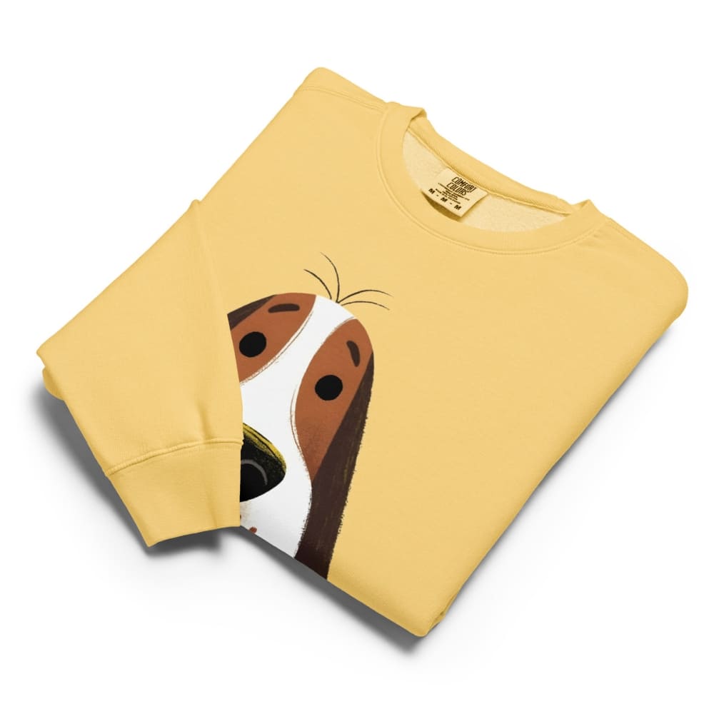 Yellow sweatshirt with a dog face design on a white background
