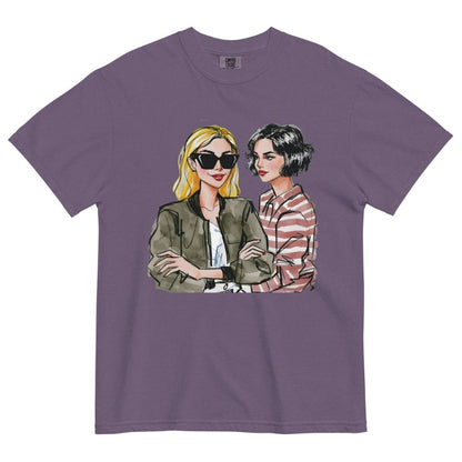 Purple t-shirt with graphic of two women on a white background
