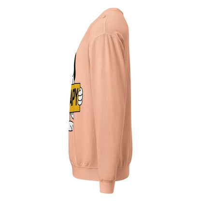 Peach-colored sweatshirt with cartoon character design on a white background