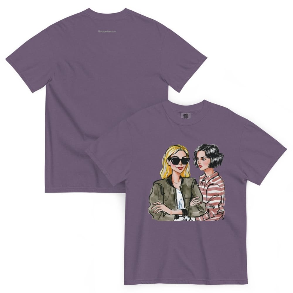 Purple t-shirt with graphic of two women on a white background