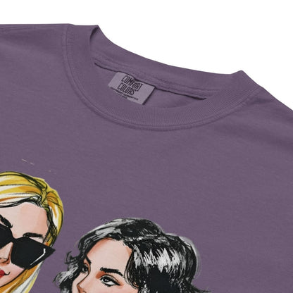 Purple t-shirt with illustrations of two women's faces and 'Comfort Colors' label.