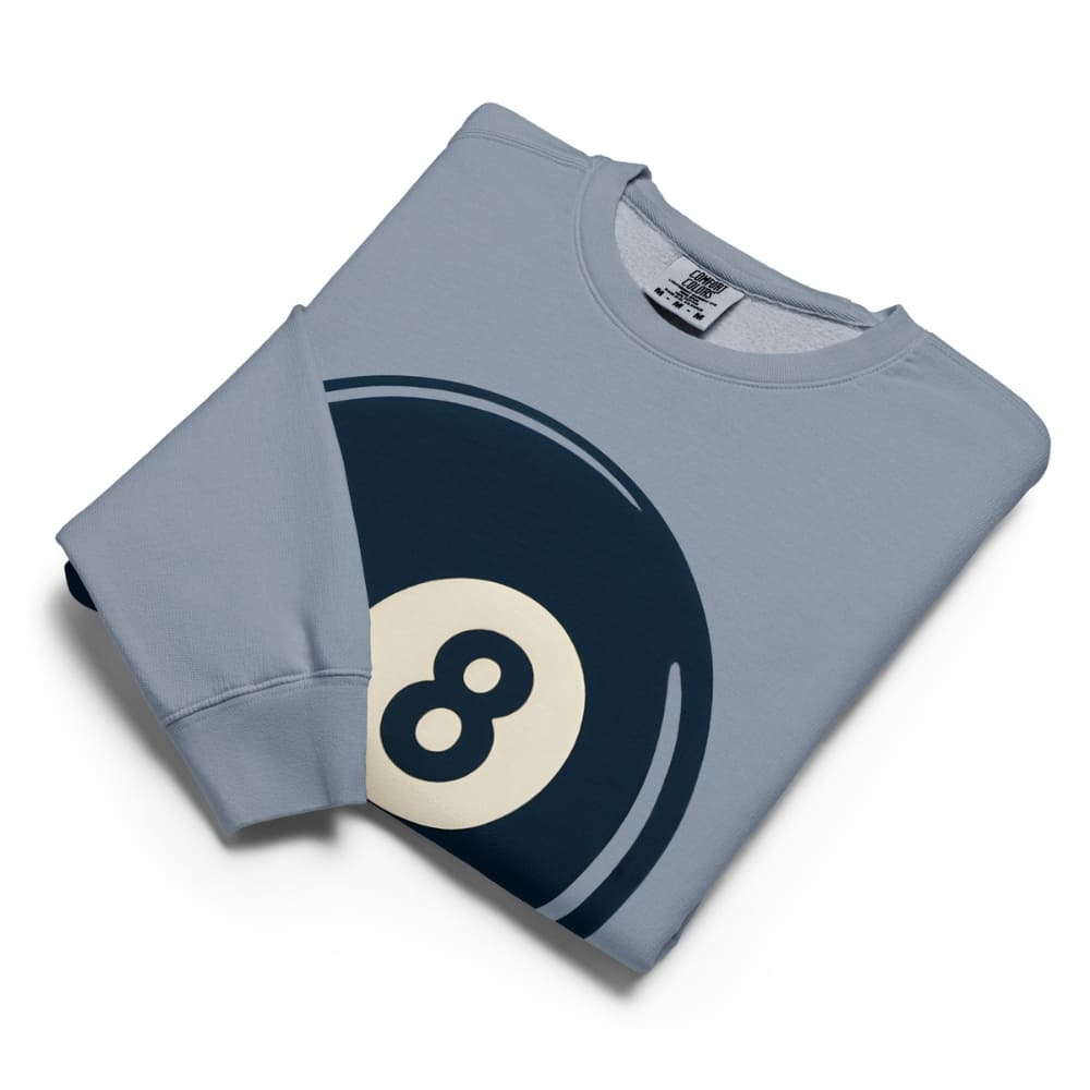 Folded light blue sweatshirt with an 8-ball design on a white background