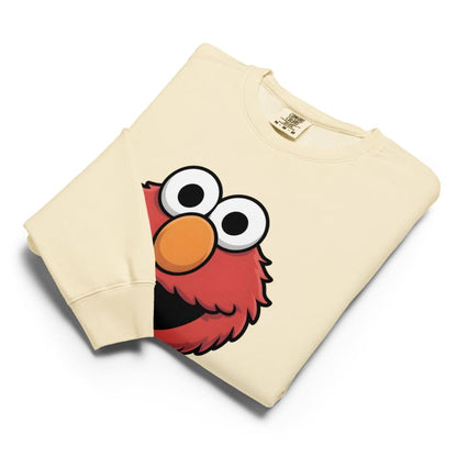 Beige sweatshirt with a cartoon character face on a white background