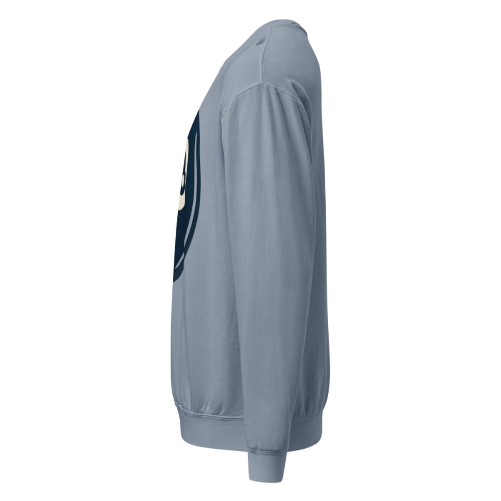 Blue sweatshirt spray bottle with a black nozzle on a white background