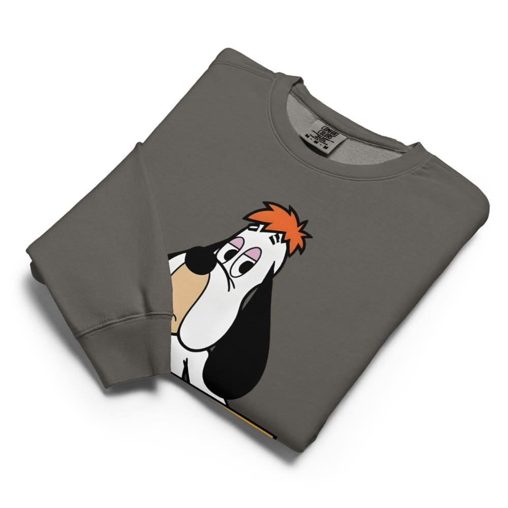 Folded gray sweatshirt with cartoon character design on a white background