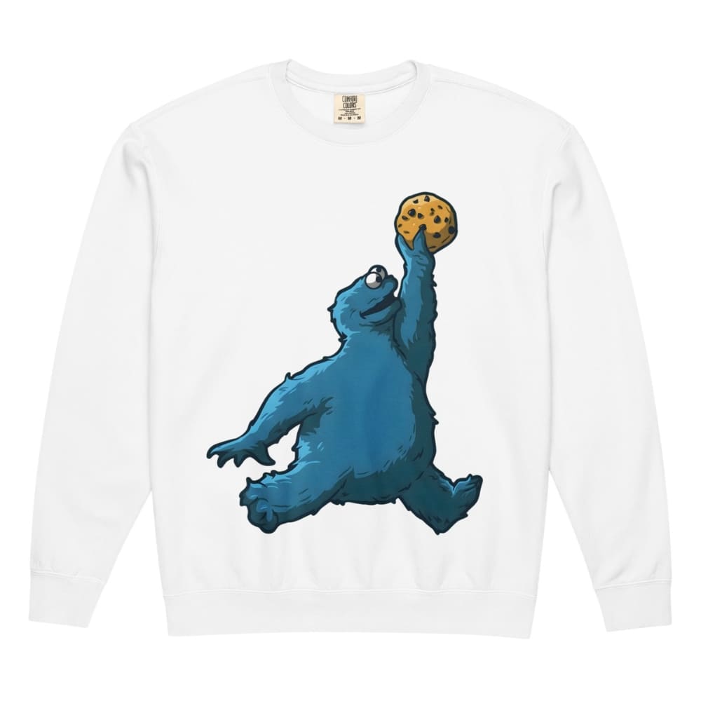 White long-sleeve shirt with a blue creature holding a cookie design on a white background