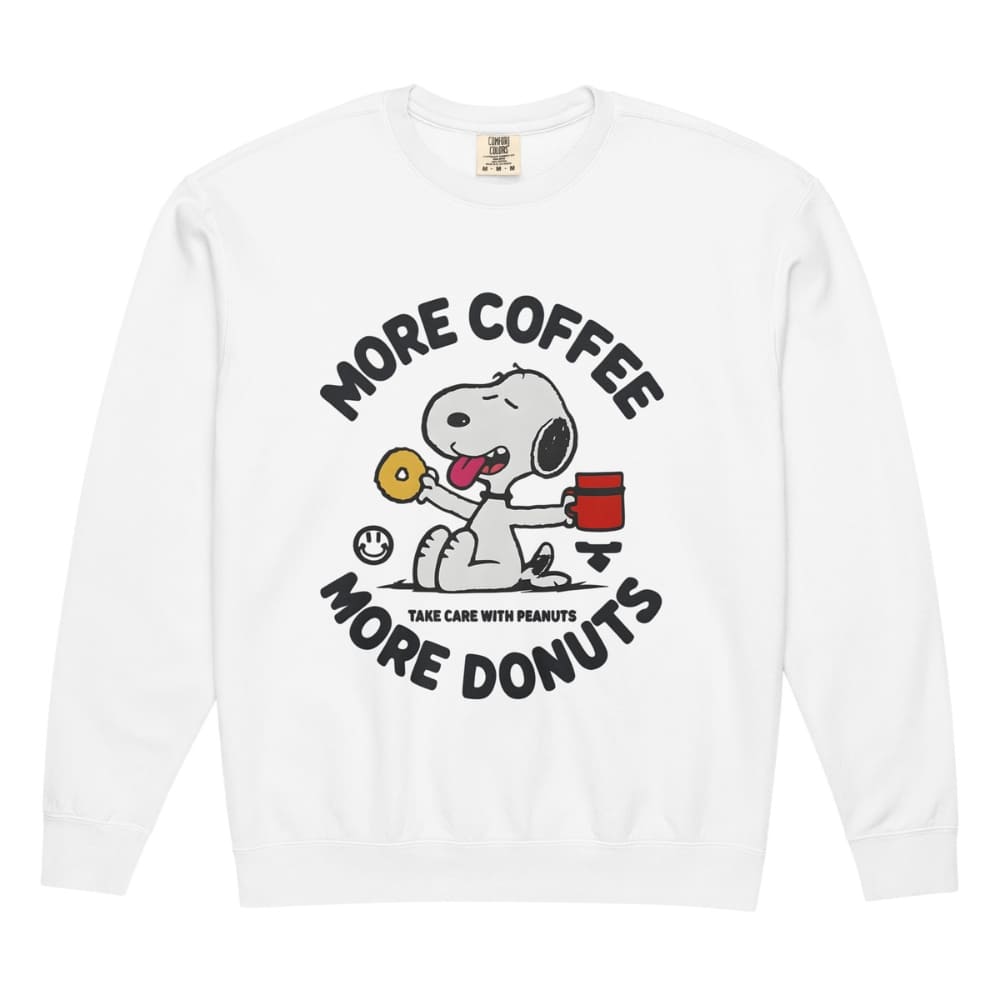 White long-sleeve shirt with Snoopy graphic and text 'More Coffee, More Donuts' on a white background