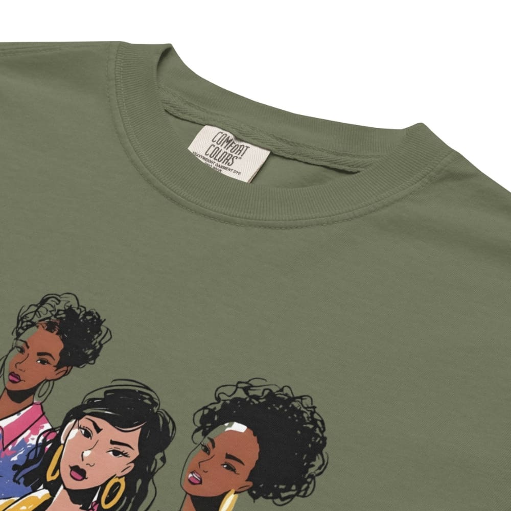 Green t-shirt with illustrations of three women on a white background