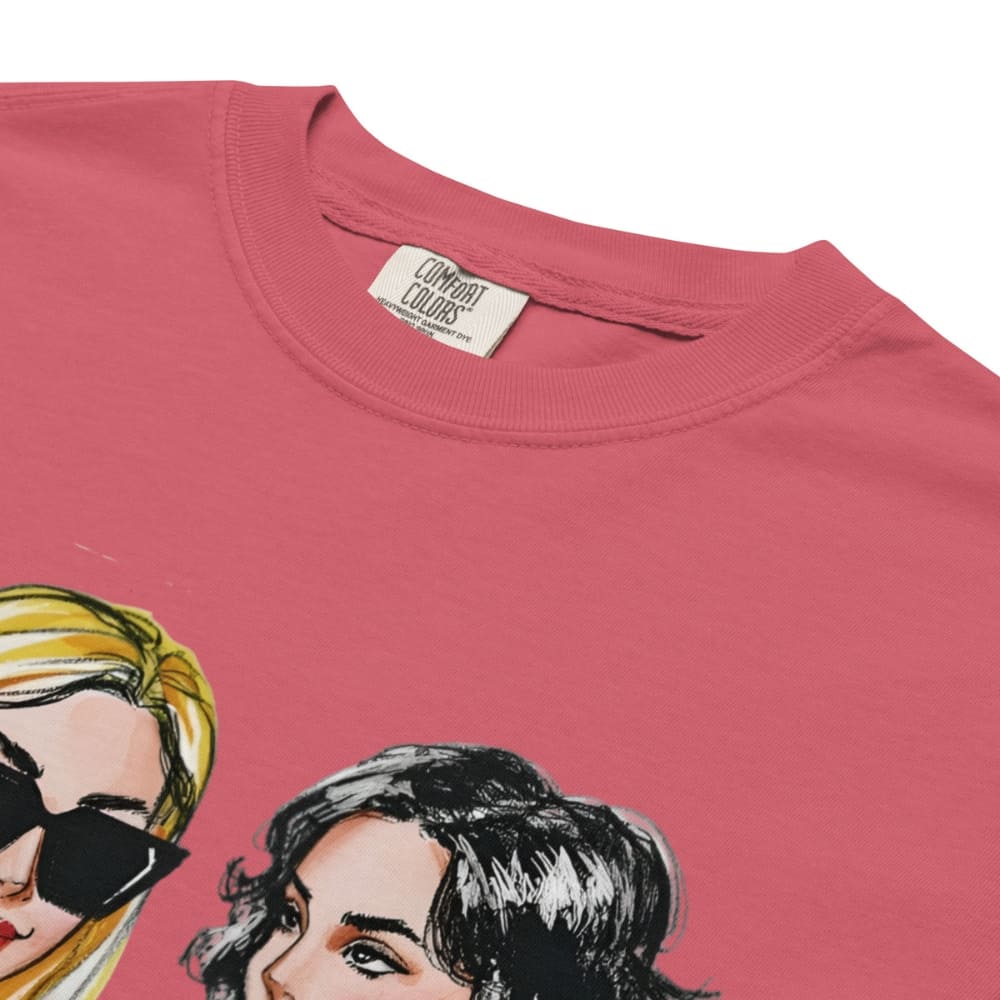 Pink t-shirt with illustrations of two women's faces and 'Comfort Colors' label.