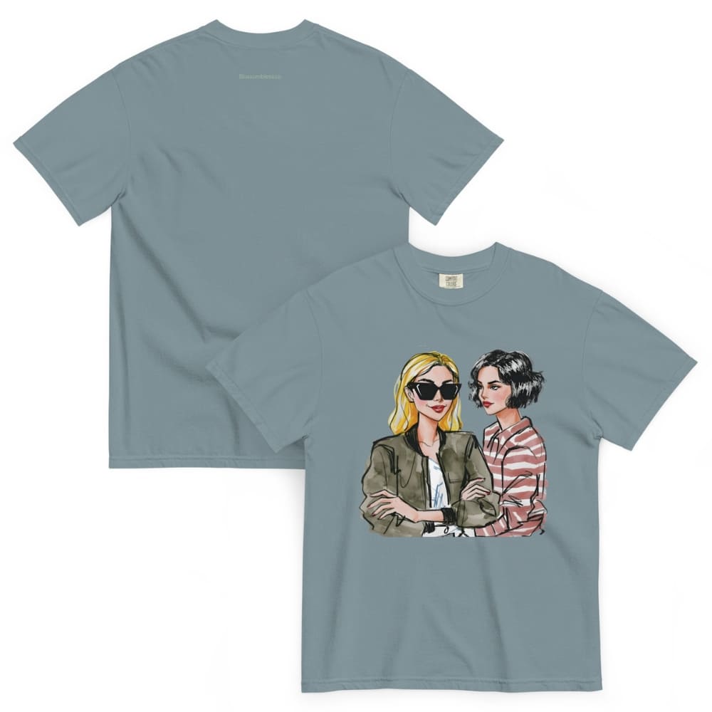Ice-blue t-shirt with graphic of two women on a white background