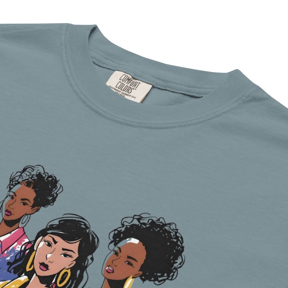 Ice-blue t-shirt with illustrations of three women on a white background