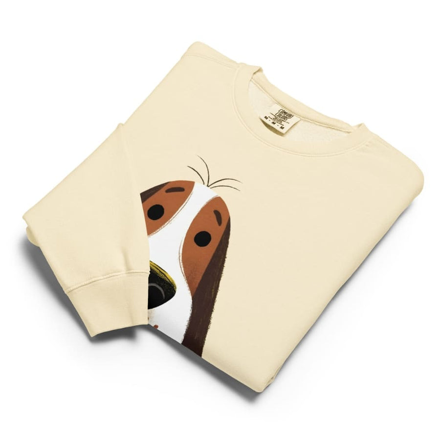 Beige sweatshirt with a cartoon dog face design on a white background