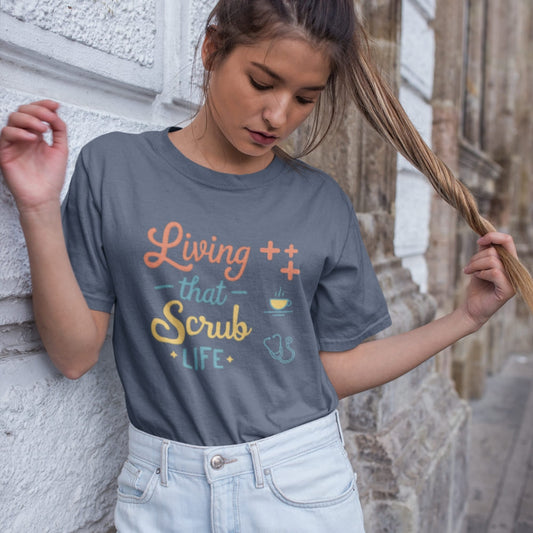 “Living That Scrub Life” colorful text printed on a garment-dyed cotton t-shirt for nurses and healthcare professionals