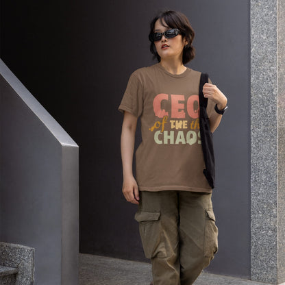 CEO of the Chaos” printed on a heavyweight cotton t-shirt in soft pastel ink, laid flat with a minimal lifestyle background.