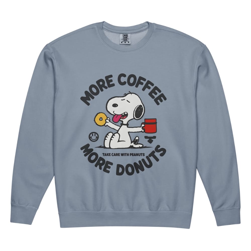 Blue sweatshirt with cartoon dog holding coffee and donut, text 'More Coffee More Donuts' on a white background