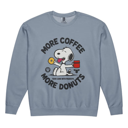 Blue sweatshirt with cartoon dog holding coffee and donut, text 'More Coffee More Donuts' on a white background