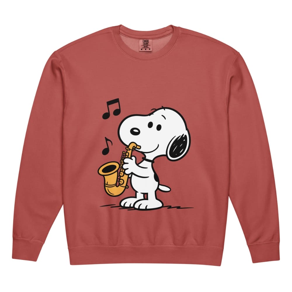 Red sweatshirt with a cartoon dog playing a saxophone on a white background