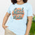 Graphic t-shirt with text “Cool Moms Raise Cool Kids” in bold vintage font – fun parenting design on soft garment-dyed cotton tee