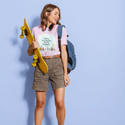 Illustrated t-shirt design with the quote "Building Tiny Humans with Big Dreams" surrounded by a family parenting scene