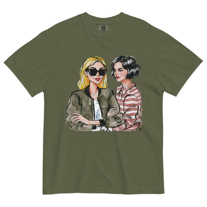 Olive green t-shirt with illustrations of two women on a white background
