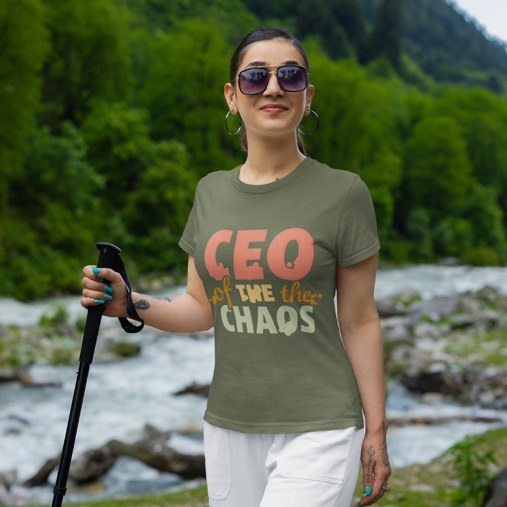 CEO of the Chaos” printed on a heavyweight cotton t-shirt in soft pastel ink, laid flat with a minimal lifestyle background.