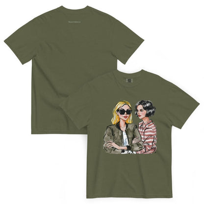 Olive green t-shirt with a graphic of two women on a white background