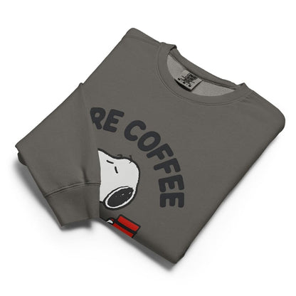 Folded gray sweatshirt with 'RE COFFEE' text and cartoon character on a white background