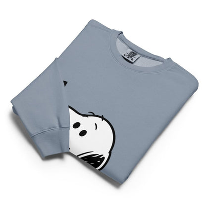 Folded light blue sweatshirt with a cartoon ghost design on a white background