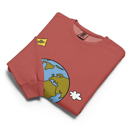 Folded red sweatshirt with cartoon design on a white background